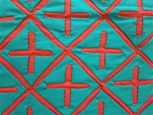 Kerstkleedje in Mola-techniek