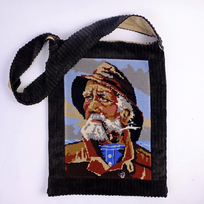 Tapisserietas man met pijp.