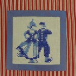 Schaatsend paartje borduurwerkje