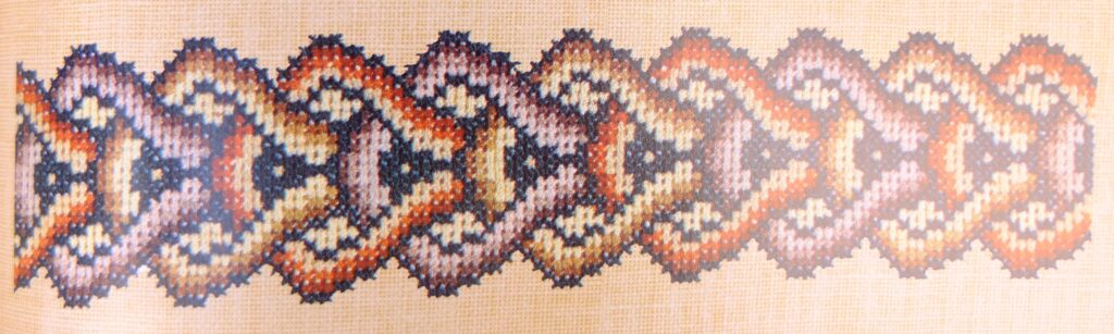 Geborduurde rand uit boek Ann Roth