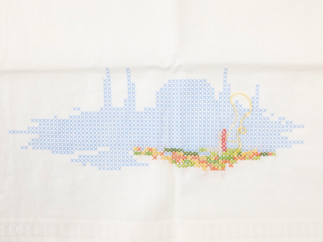 Detail borduurwerk kleedje