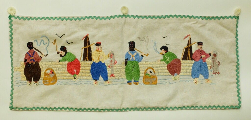 Borduurwerk in platsteek vissers