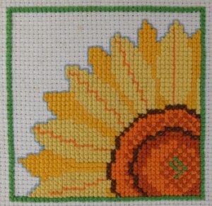 Geborduurde zonnebloem