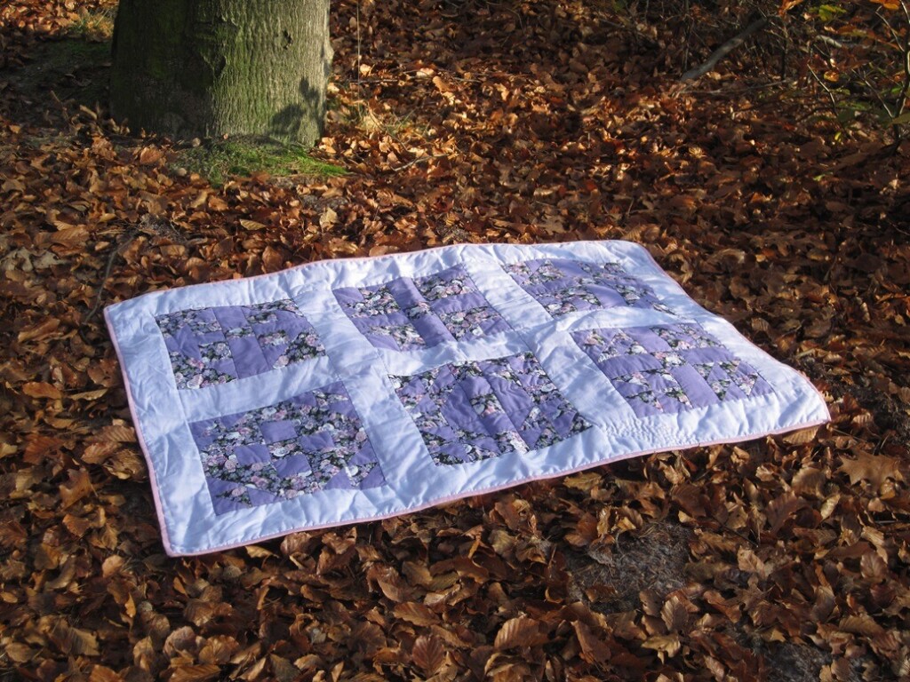 Sampler quilt in bos