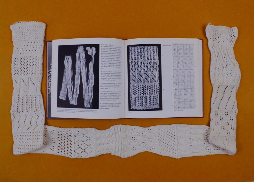 Lange lap kunstbreien met boek