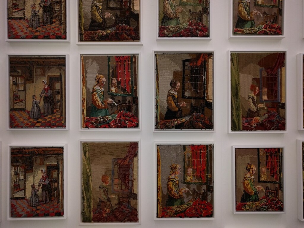 tapisserie borduurwerken brieflezend meisje bij venster